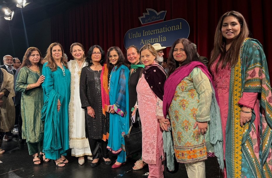 A group of women posing for a photo

Description automatically generated