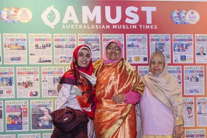 A group of women posing for a photo

Description automatically generated