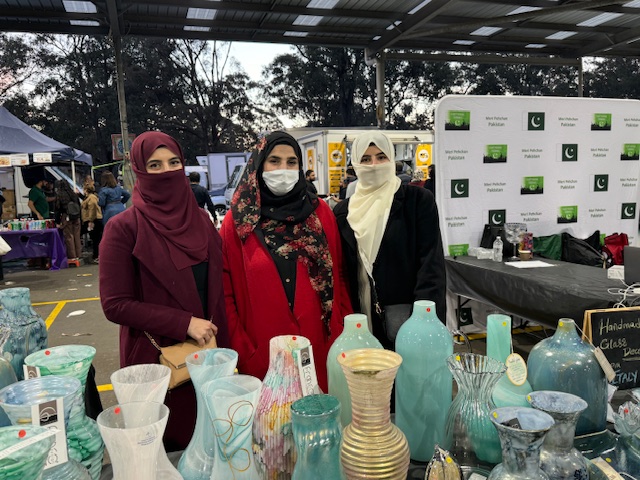 A group of women wearing face masks

Description automatically generated