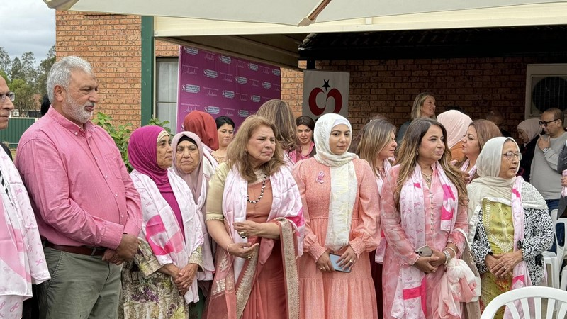 A group of women standing in a line

Description automatically generated